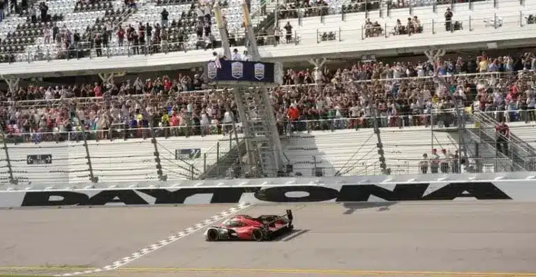 Felipe Nasr crosses the finish line to win the third straight Rolex 24 for the No. 7 Penske Porsche team, Sunday, Jan. 25, 2026 at Daytona International Speedway.