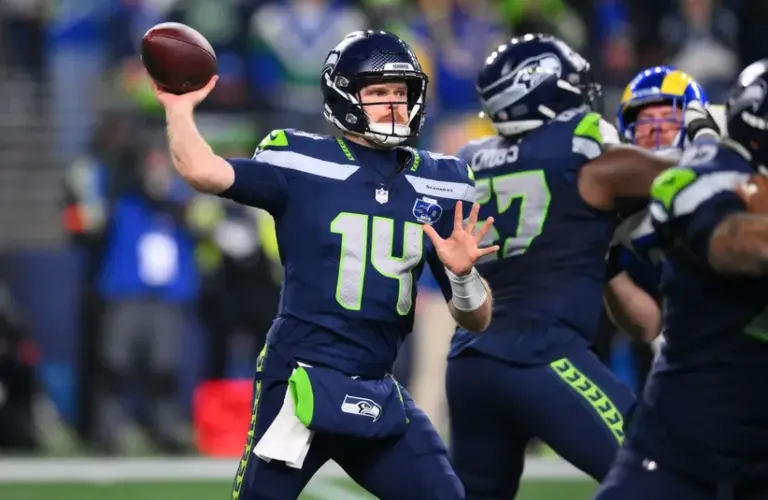 Seattle Seahawks quarterback Sam Darnold (14) passes against the Los Angeles Rams during the second half in the 2026 NFC Championship Game at Lumen Field