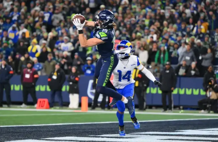 Seattle Seahawks wide receiver Jake Bobo (19) makes a catch to score a touchdown against the Los Angeles Rams during the second half in the 2026 NFC Championship Game.