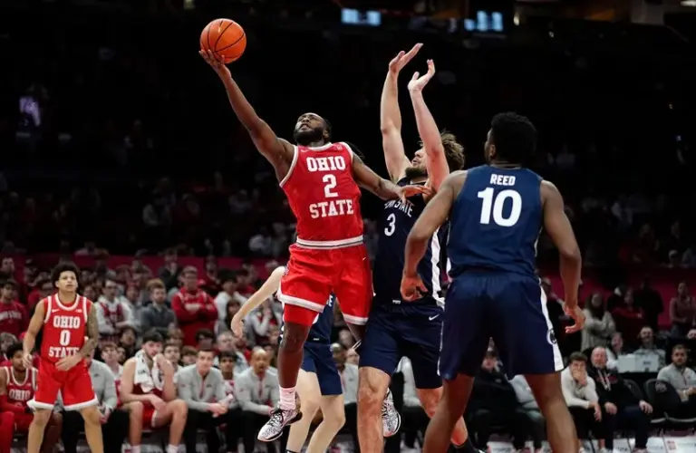Ohio State Buckeyes guard Bruce Thornton (2) drives past Penn State Nittany Lions forward Ivan Juric (3)