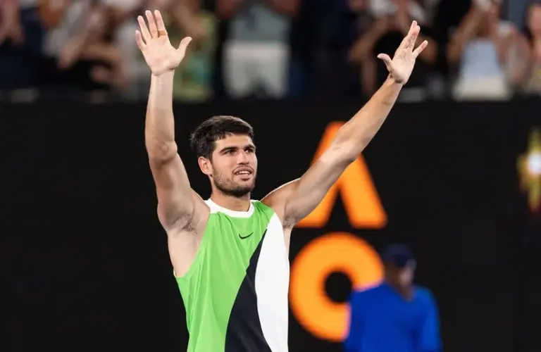 Jan 27, 2026; Melbourne, Victoria, Australia; Carlos Alcaraz of Spain celebrates his victory over Alex de Minaur of Australia in the quarterfinals of the men’s singles at the Australian Open at Rod Laver Arena in Melbourne Park.