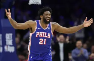 Philadelphia 76ers center Joel Embiid (21) reacts after his dunk against the Milwaukee Bucks during the second quarter at Xfinity Mobile Arena.