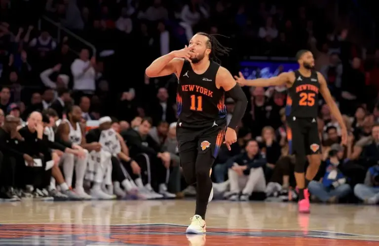 ; New York Knicks guard Jalen Brunson (11) celebrates his three point shot against the Sacramento Kings during the fourth quarter at Madison Square Garden.