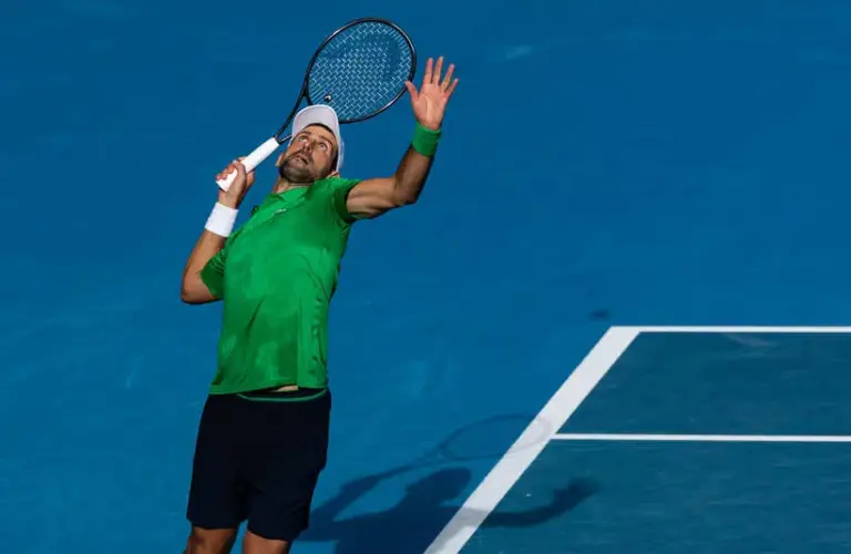 Novak Djokovic of Serbia in action against Lorenzo Musetti of Italy in the quarterfinals of the menís singles at the Australian Open at Rod Laver Arena in Melbourne Park.