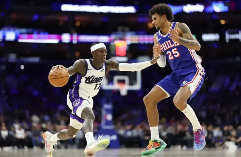 Sacramento Kings guard Dennis Schroder (17) controls the ball against Philadelphia 76ers forward Dominick Barlow (25) during the first quarter at Xfinity Mobile Arena