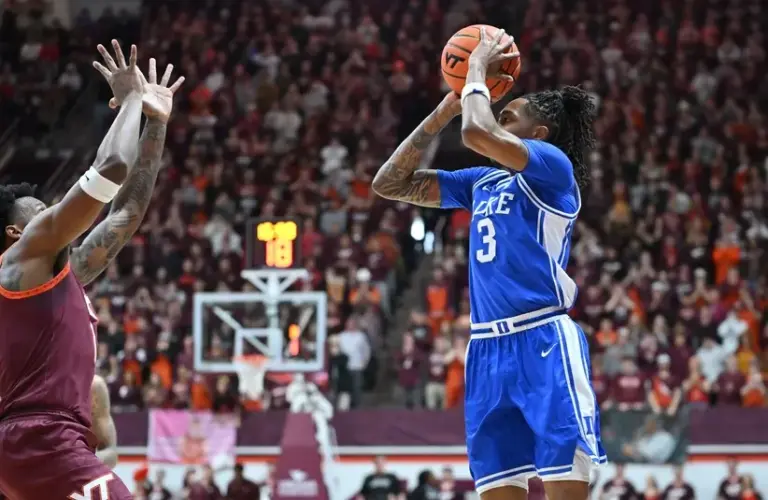 Duke Blue Devils guard Isaiah Evans (3) shoots a shot as Virginia Tech Hokies forward Amani Hansberry (13) defends during the first half at Cassell Coliseum