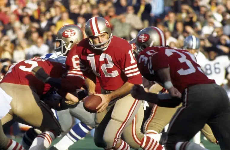 San Francisco 49ers quarterback John Brodie (12) in action against the Dallas Cowboys during the 1972 NFC Divisional Playoff Game at Candlestick Park.