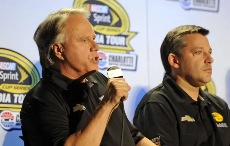 Stewart Haas Racing co-owner Gene Haas addresses the media while seated next to driver Tony Stewart (right) during the Sprint Media Tour at the Charlotte Convention Center.