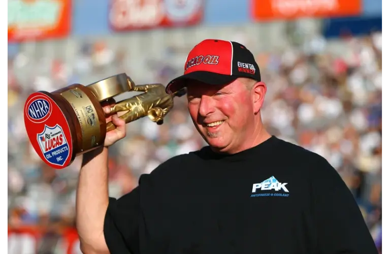 Feb 14, 2016; Pomona, CA, USA; NHRA stock eliminator driver Dan Fletcher celebrates after winning the Winternationals at Auto Club Raceway at Pomona.