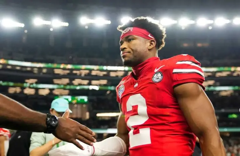 Ohio State Buckeyes defensive back Caleb Downs, one of the changes, (2) leaves the field following the Cotton Bowl at AT&T Stadium in Arlington, Texas for the College Football Playoff quarterfinal game against the Miami Hurricanes on Dec. 31, 2025. Ohio State lost 24-14.