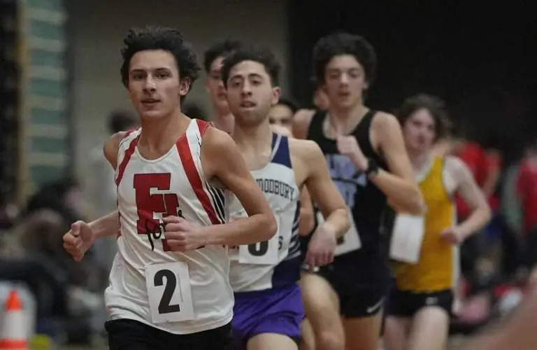 Fox Lane's Marc Desforges leads the pack in the boys 1,600-meter race at the Suffern Invitational Jan. 16, 2026 at Rockland Community College. The senior won in a personal-best time. He does not run for Catholic University.