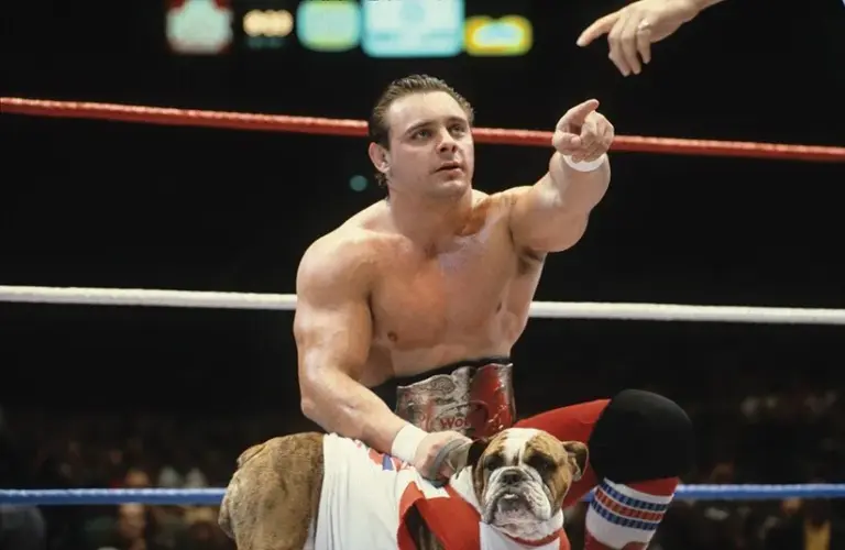 Dynamite Kid Pointing With Matilda In The Middle Of The Ring