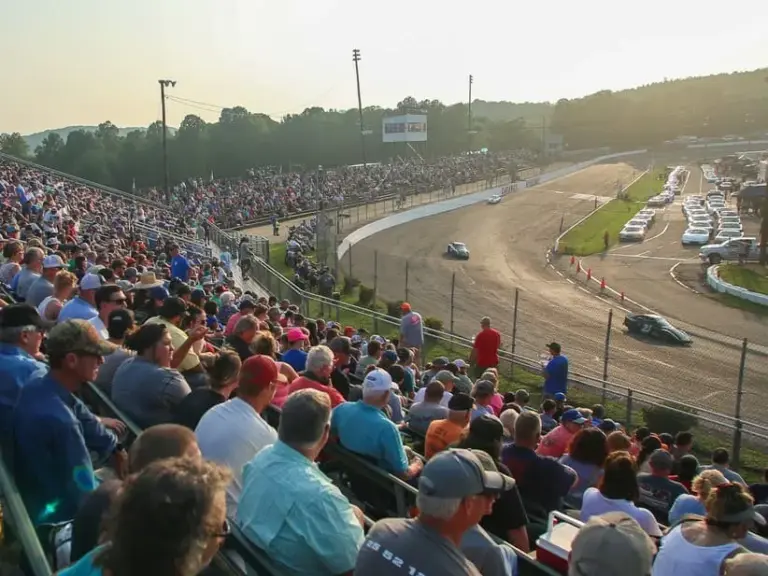 Spectators watching the NASCAR Weekly Series at Caraway Speedway.