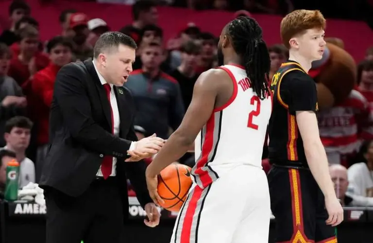Ohio State Buckeyes head coach Jake Diebler celebrates with guard Bruce Thornton (2) during the second half of the NCAA men's basketball game against the USC Trojans at the Schottenstein Center on Feb. 11, 2026. Ohio State won 89-82.
