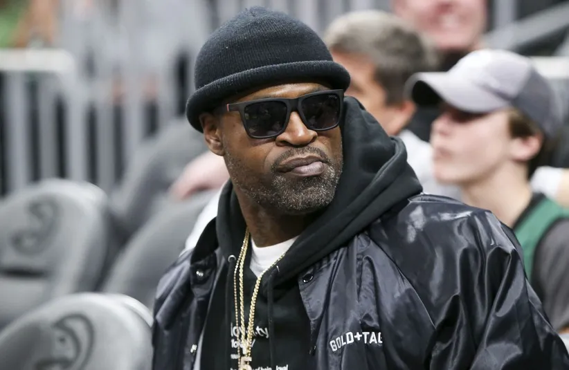 Former NBA player Stephen Jackson watches a game
