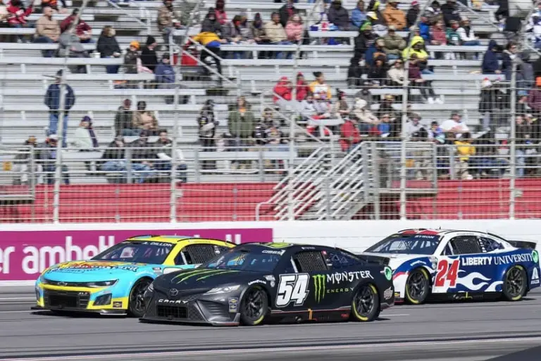 Drafting; Mar 19, 2023; Hampton, Georgia, USA; NASCAR Cup Series driver Ty Gibbs (54), NASCAR Cup Series driver Austin Dillon (3) battle ahead of NASCAR Cup Series driver William Byron (24) at Atlanta Motor Speedway.