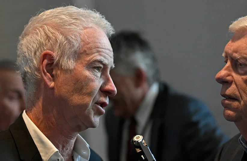 McEnroe talking to Gary McKillips