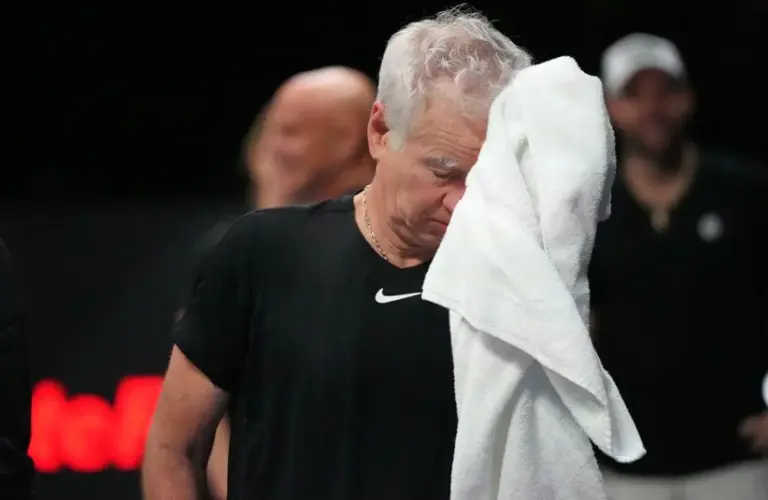 McEnroe wiping his sweat
