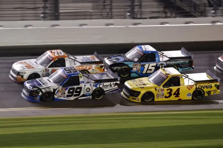 Entry List; Feb 14, 2025; Daytona Beach, Florida, USA; NASCAR Truck Series driver Ben Rhodes (99) and driver Parker Kligerman (75) race side by side during the Fresh From Florida 250 at Daytona International Speedway.