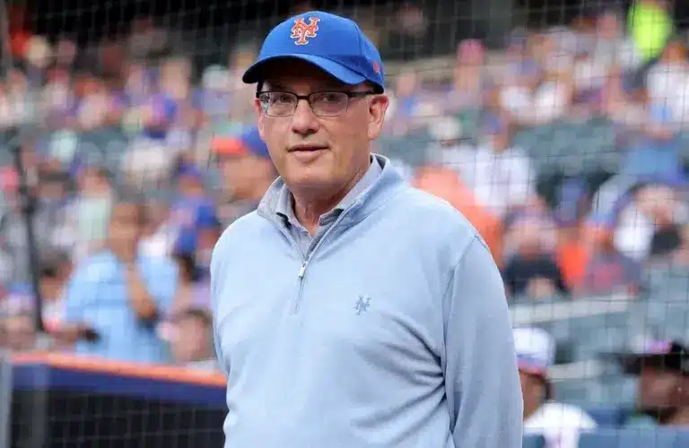 New York Mets owner Steve Cohen stands on the field before a ceremony