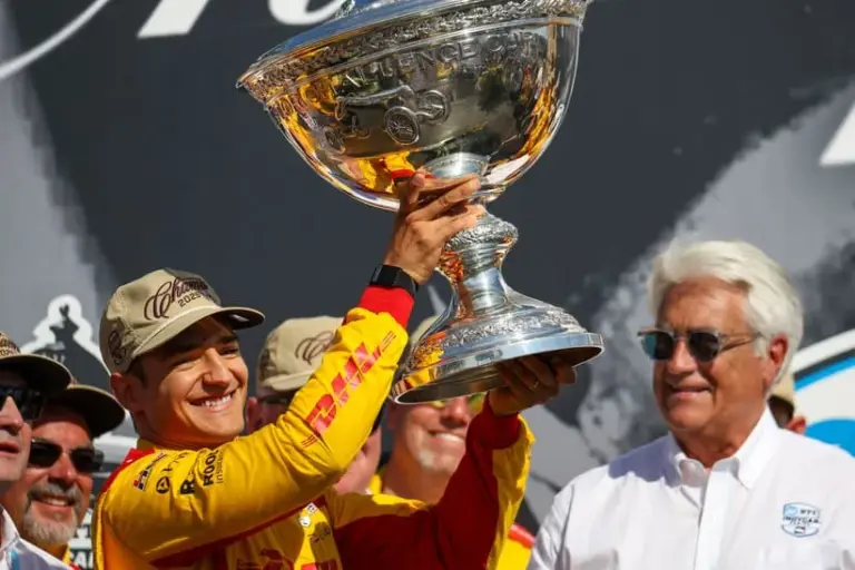 McLaren; Aug 31, 2025; Lebanon, Tennessee, USA; Chip Ganassi Racing driver Alex Palou (10) of Spain wins the Indycar Championship trophy after finishing second at the Borchetta Bourbon Music City Grand Prix at Nashville Superspeedway.