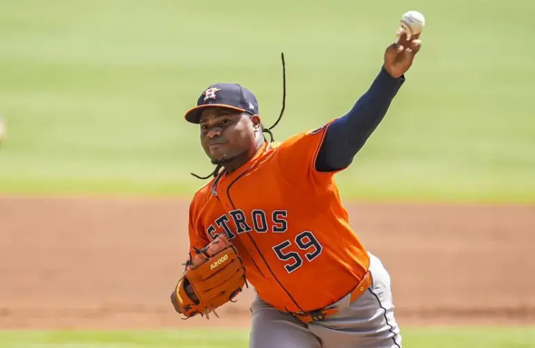 Houston Astros starting pitcher Framber Valdez (59) pitches against the Atlanta Braves during the first inning at Truist Park.