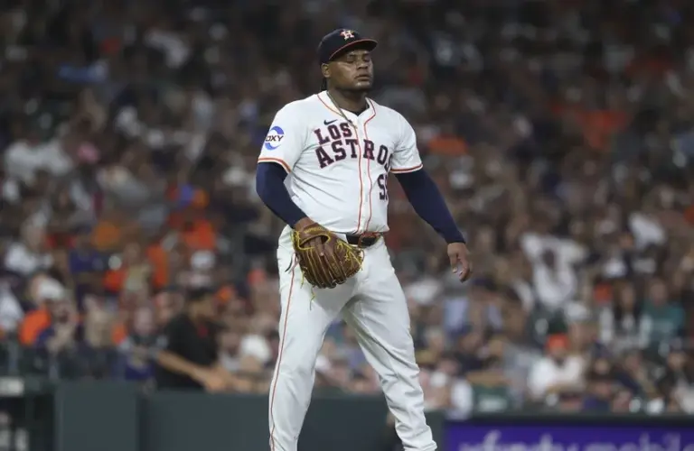 Houston Astros starting pitcher Framber Valdez (59) reacts after a play during the fourth inning against the Seattle Mariners at Daikin Park.
