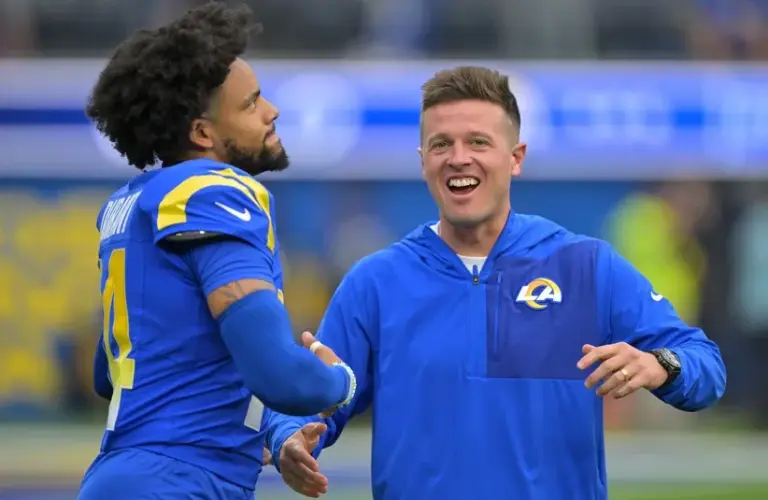 Los Angeles Rams cornerback Cobie Durant (14) and offensive coordinator Mike LaFleur as they get ready for the game against the Indianapolis Colts at SoFi Stadium.