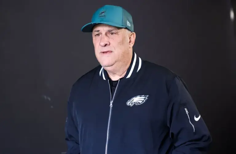 Philadelphia Eagles defensive coordinator Vic Fangio walks onto the field