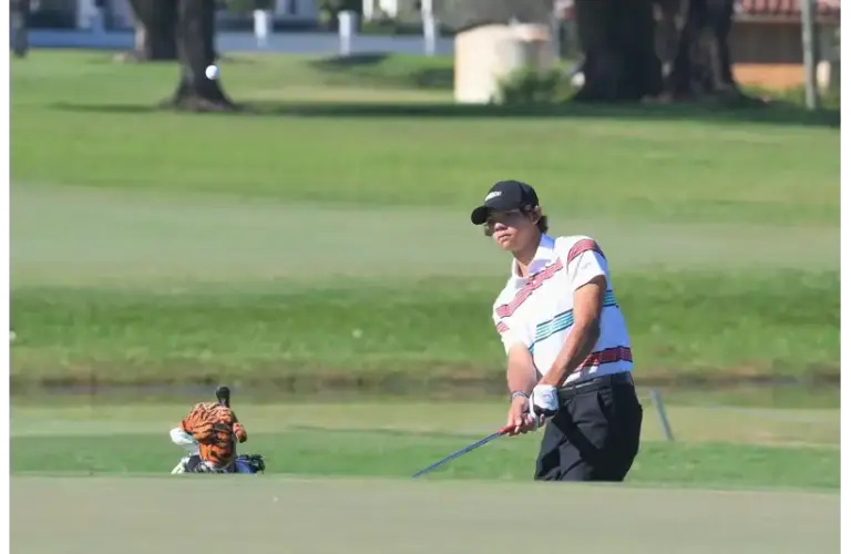 Charlie Woods chips onto the seventh green during the Junior Orange Bowl on Jan. 3, 2026.