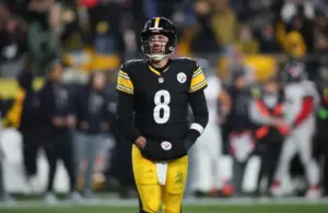 Pittsburgh Steelers quarterback Aaron Rodgers (8) looks on after being sacked during the first half of the NFL Wild Card game against the Houston Texans at Acrisure Stadium in Pittsburgh, PA on January 12, 2026