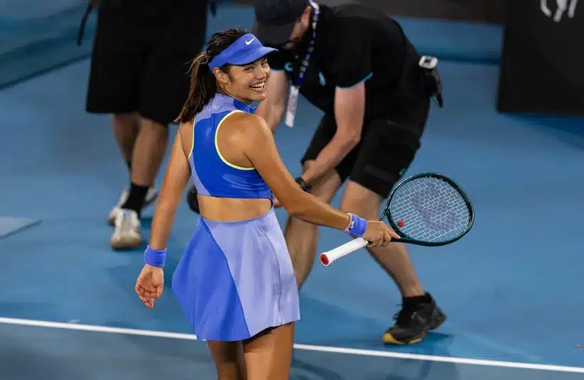 Raducanu looking at his coaching staff