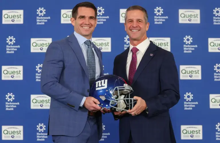 Giants GM Joe Schoen and Head Coach John Harbaugh Posing For Photo With Giants Helmet