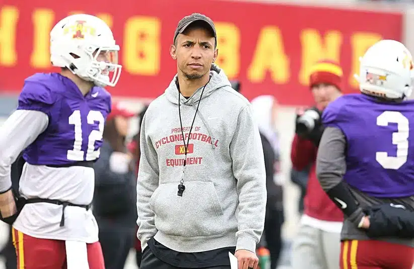 Offensive Coordinator/Quarterbacks Nate Scheelhaase watches practice.