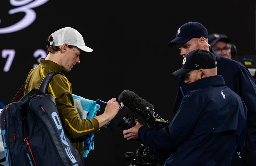 Sinner signing autograph