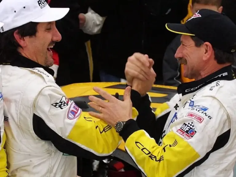 Dale Earnhardt in Daytona's Victory Lane after the 2001 Rolex 24, but not as a winner. Here he congratulates Ron Fellows, one of the co-drivers of the winning Corvette team. Its sister car, with Earnhardt as a co-driver, finished fourth.