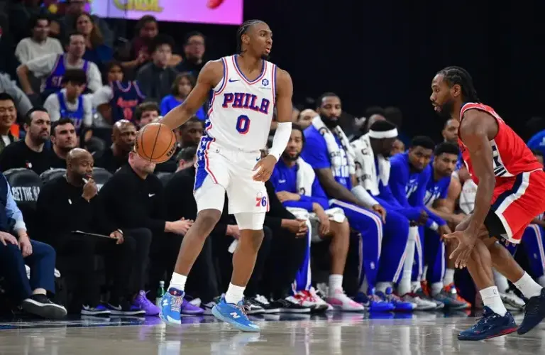 Philadelphia 76ers guard Tyrese Maxey (0) controls the ball against Los Angeles Clippers forward Kawhi Leonard (2) during the first half.