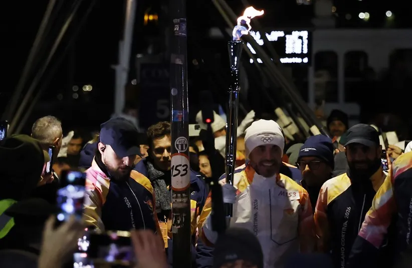 The Olympics flame arrives in Como, Italy during stage 58 of the Olympic Torch Relay in preparation for the Milano Cortina 2026 Olympic Winter Games