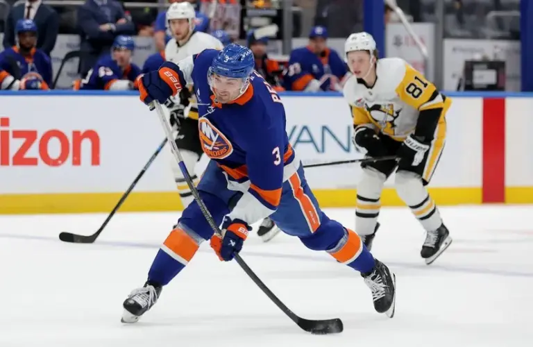 New York Islanders defenseman Adam Pelech (3) takes a shot against the Pittsburgh Penguins during the second period at UBS Arena.