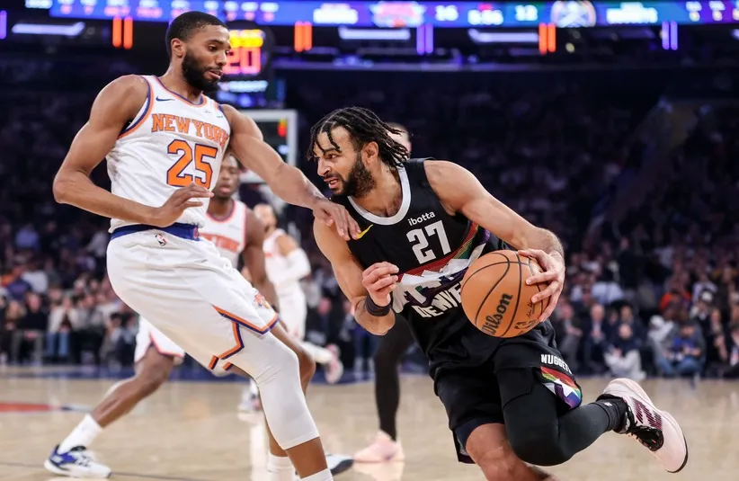 Denver Nuggets guard Jamal Murray (27) drives to the basket against New York Knicks guard Mikal Bridges (25)