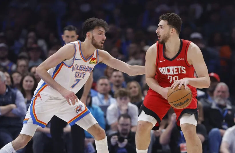 Oklahoma City Thunder center/forward Chet Holmgren (7) defends a drive by Houston Rockets center Alperen Sengun (28) during the first half at Paycom Center