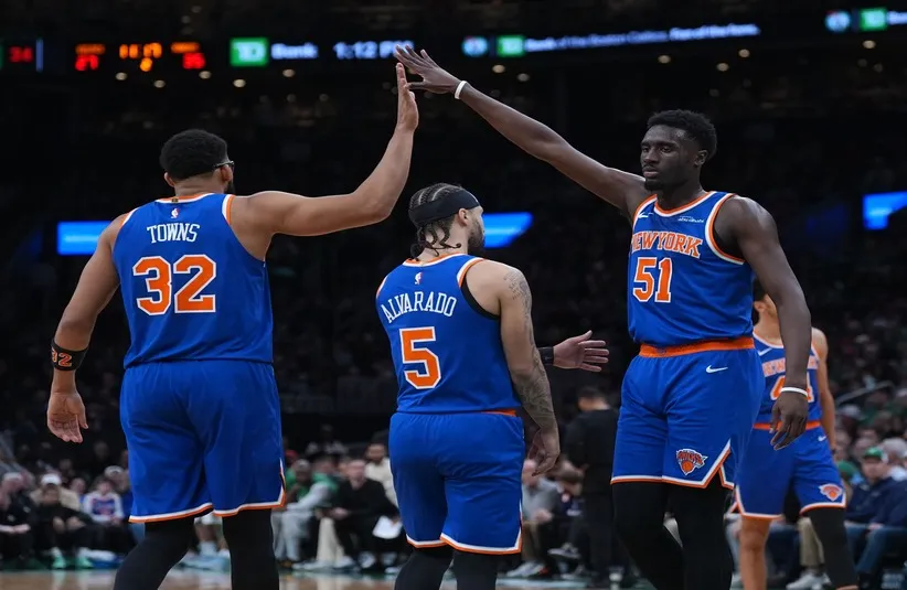 New York Knicks forward Mohamed Diawara (51) and center Karl-Anthony Towns (32) react after a play against the Boston Celtics in the sec.ond quarter at TD Garden