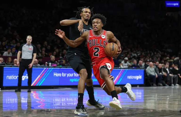 Collin Sexton drives to the basket against the Nets.