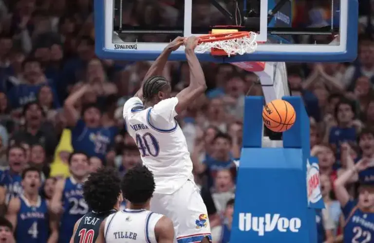Kansas Jayhawks forward Flory Bidunga (40) dunks the ball against Arizona Wildcats during the game inside Allen Fieldhouse.