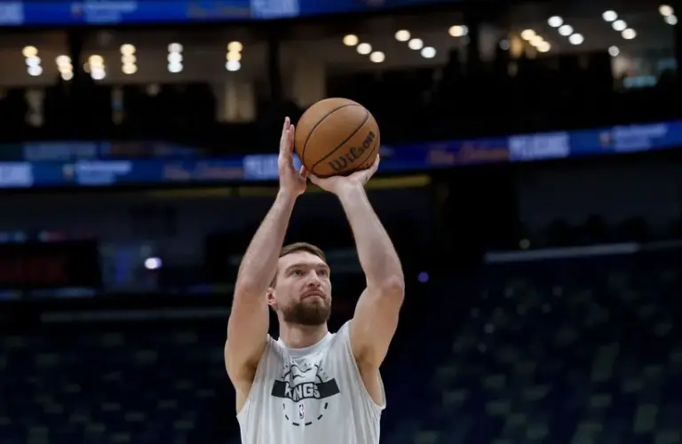 Sacramento Kings forward Domantas Sabonis warms up before a game