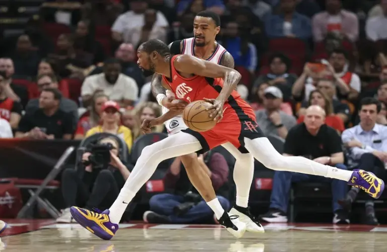 Houston Rockets forward Kevin Durant (7) drives with the ball as Los Angeles Clippers forward John Collins (20) defends during the second quarter