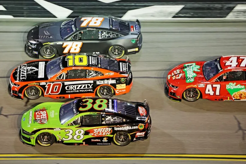 Feb 12, 2026; Daytona Beach, Florida, USA; Driver Zane Smith (38) and driver Ty Dillon (10) during the Duel 2 at Daytona at Daytona International Speedway