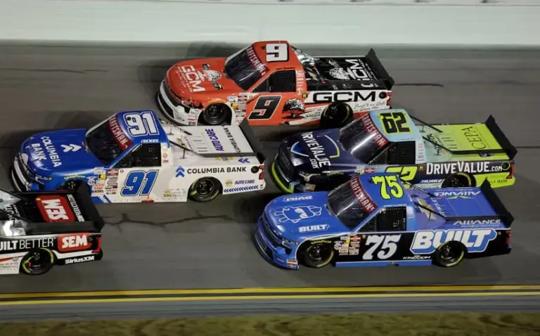 Atlanta; Feb 13, 2026; Daytona Beach, Florida, USA; NASCAR Truck Series driver Christian Eckes (91) races Grant Enfinger (9), John Hunter Nemecheck (62) and Corey Lajoie (75) during the Craftsman Truck series Fresh From Florida 250 at Daytona International Speedway.