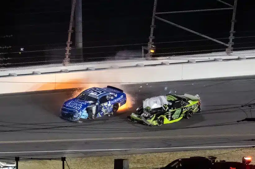 Feb 14, 2026; Daytona Beach, Florida, USA; NASCAR O’Reilly Auto Parts Series driver Natalie Decker (35) and Sam Mayer (41) crash during the United Rentals 300 at Daytona International Speedway.