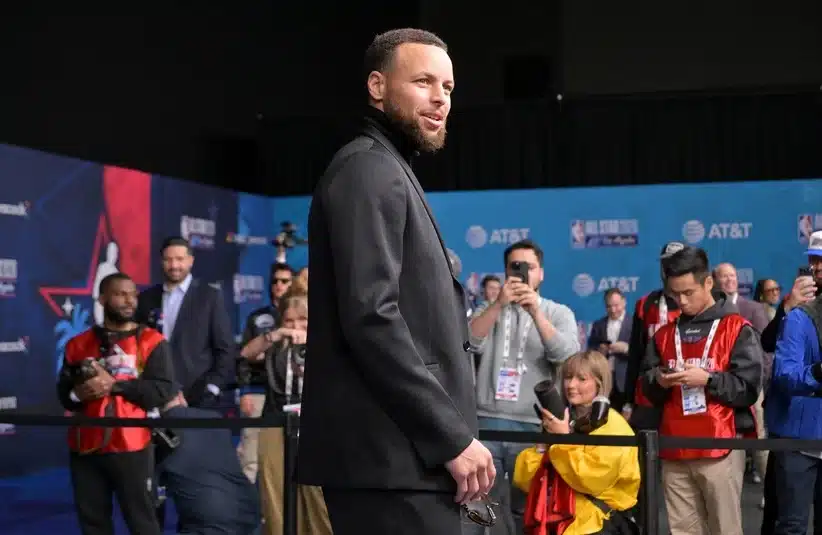 Steph Curry looking at the photographers